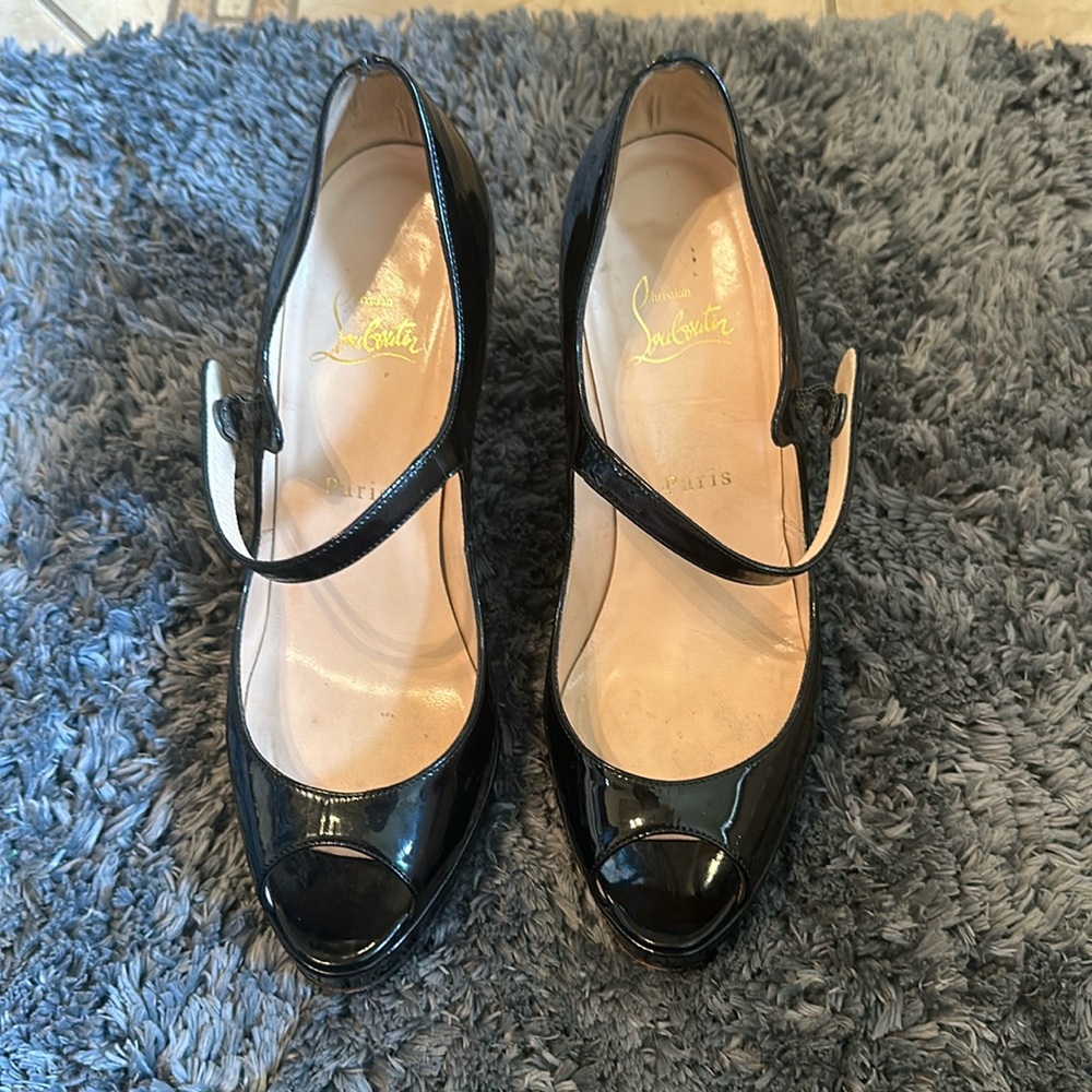 Christian Louboutin heels black in worn condition for a great deal!